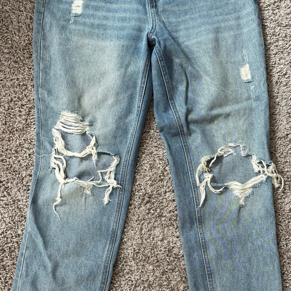 Blue Boyfriend Jeans with Knee Distressing and Vintage Fading